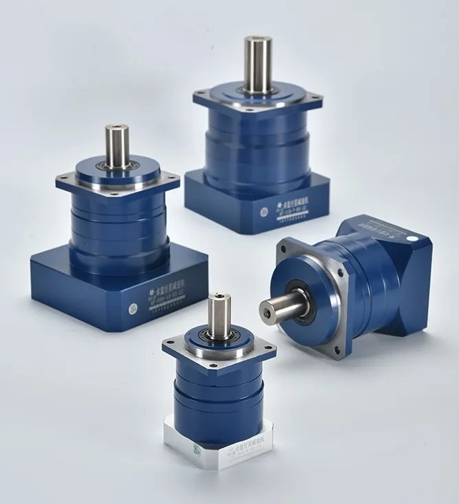 Four blue and silver planetary gearboxes, including right-angle and inline models, are arranged on a white surface.