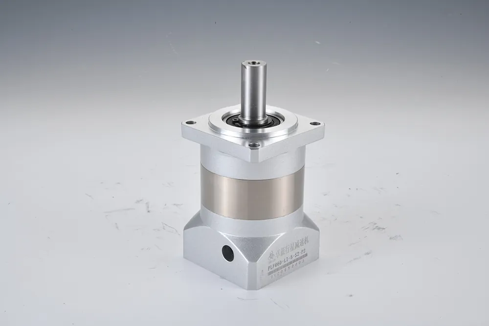 A silver inline planetary gearbox with a square mounting flange and a smooth output shaft, labeled "PLF060-L1-5-S2-P2" in Chinese.