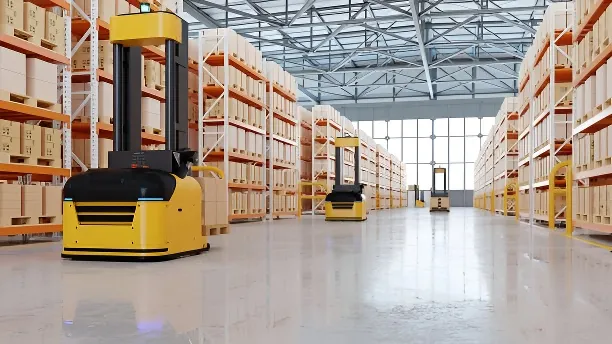 Four autonomous warehouse robots with glowing blue lights in a row in front of metal shelves filled with boxes.