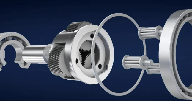 Exploded view of a planetary gearbox assembly, showing gears, bearings, and shafts against a dark blue background.